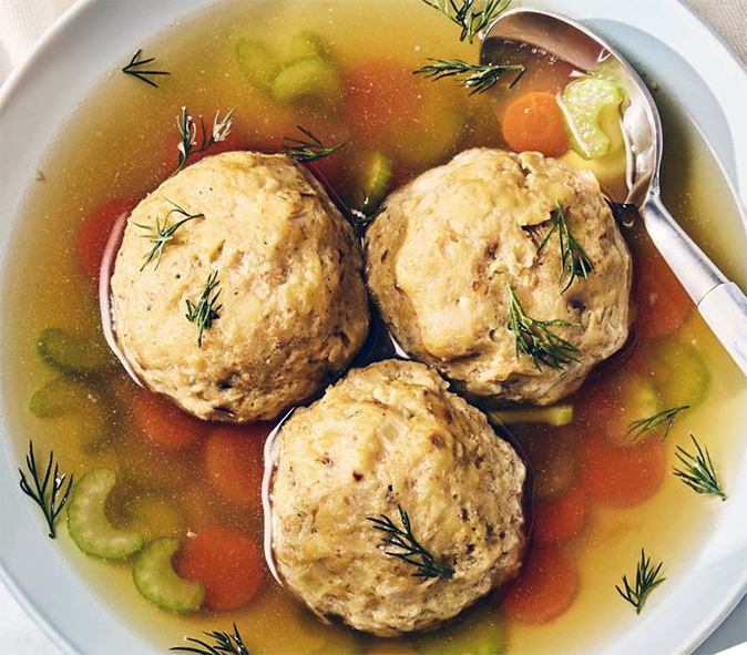 matzo balls served in a soup