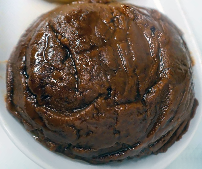 mboh, Cameroonian peanut paste on a white dish