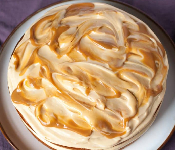 banana cake topped with dulce de leche icing