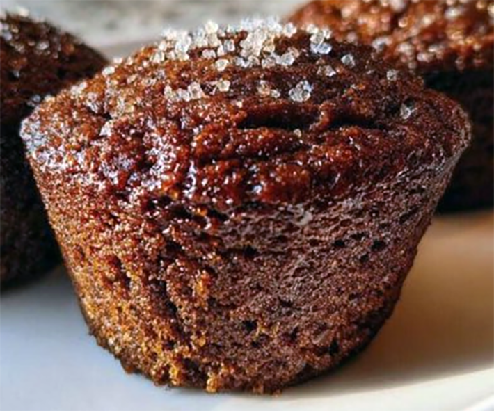 baked molasses refrigerator muffin garnished with sugar crystals served on a plate