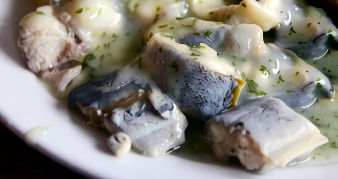 stewed eels with tartar sauce on a plate