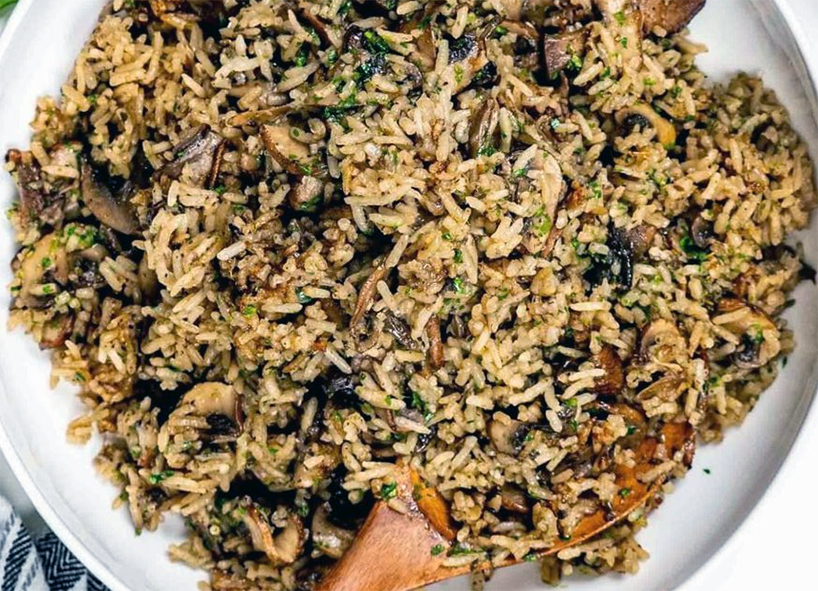 mushroom rice stuffing in a serving bowl
