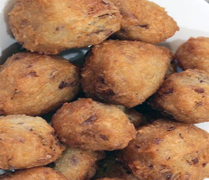 golden ojojo, yam fritter balls served on a plate