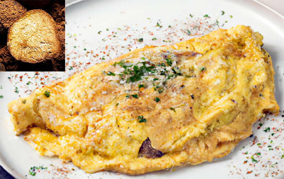 omelette with kahahari truffle shown folded on a plate with an image of a kalahari truffle shown, inset