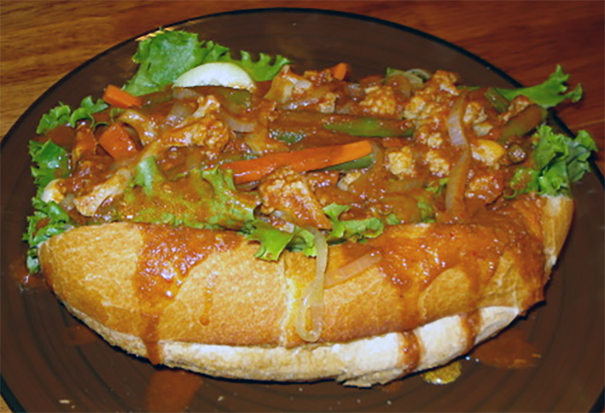Salvedorean style bread rolls stuffed with chicken and multiple fillings