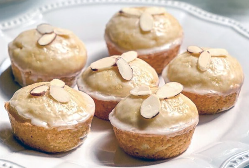 almond fairy cakes decorated with three slivered almonds apiece