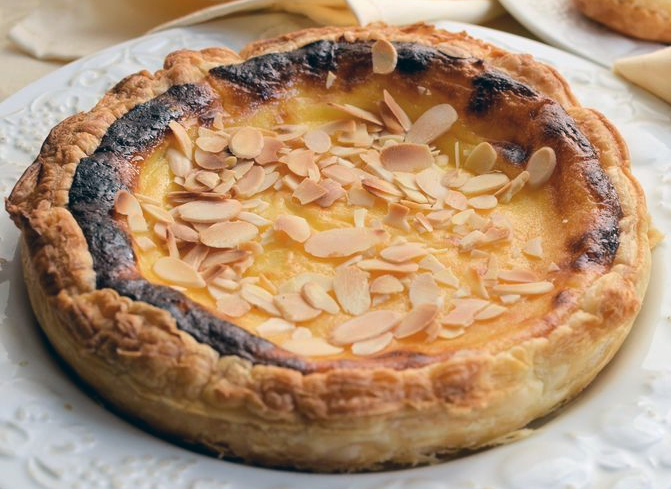 almond custard baked in puff pastry with a slivered almond garnish