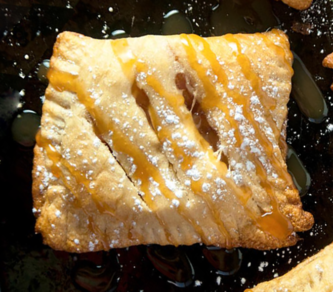 square mini apple turnover on a plate