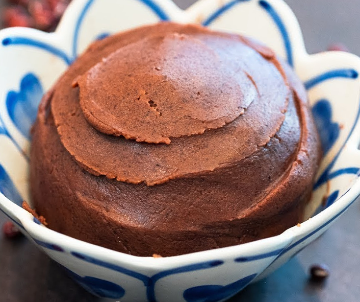 steamed bean paste pudding in a decorative bowl