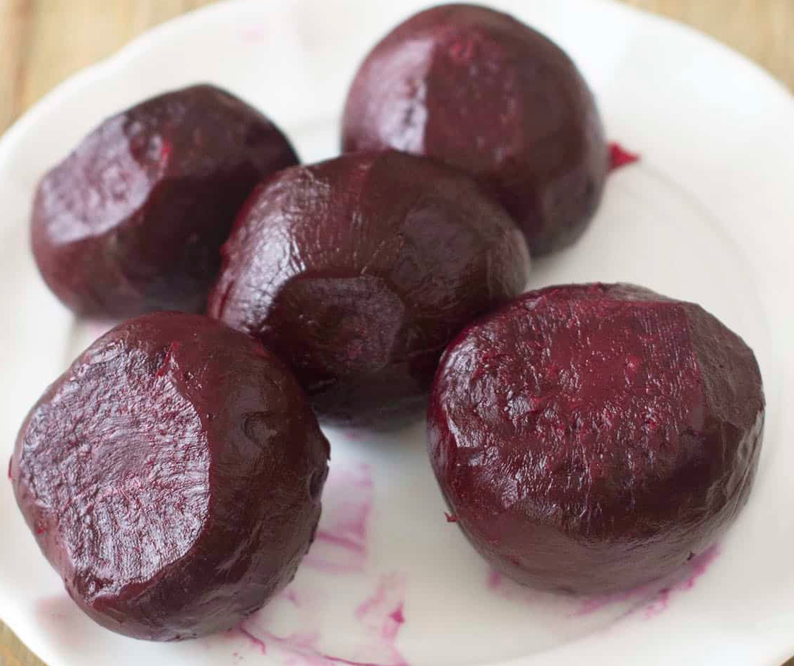boiled and peeled beetroot on a plate