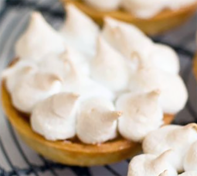 pastry filled and topped with an almond and orange flower water meringue