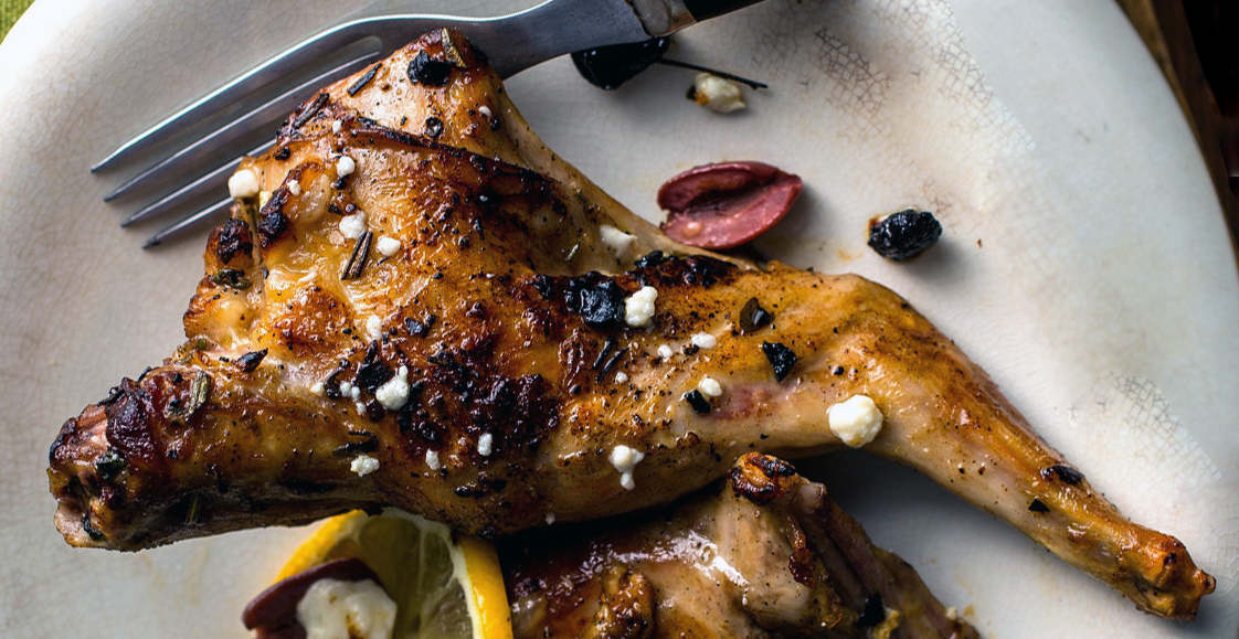pit oven roasted rabbit on a plate