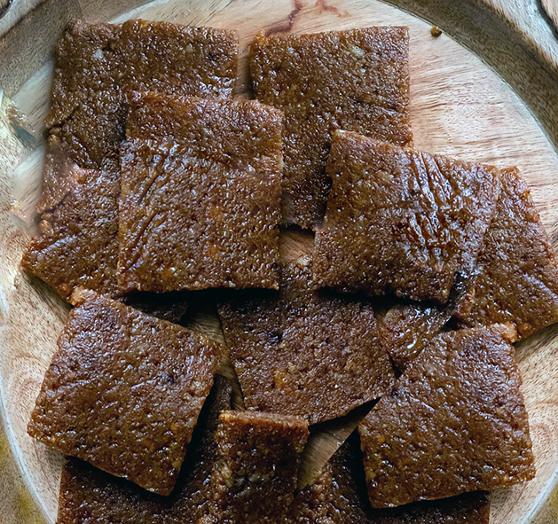 squares of nouie gingerbread on a wooden board