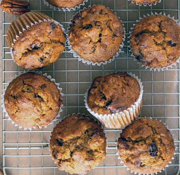 pumpkin, ginseng and nut muffins on a cooling rack