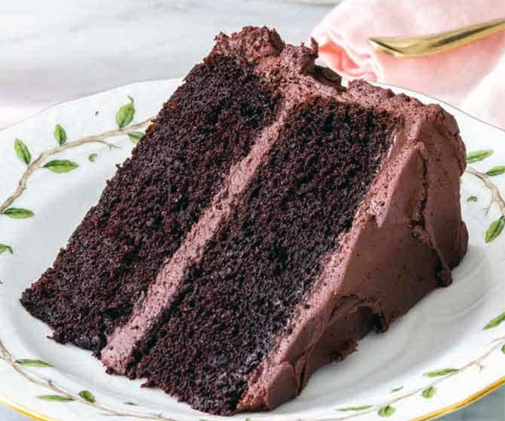 Slice of two layer quick mix devil's food cake on a plate
