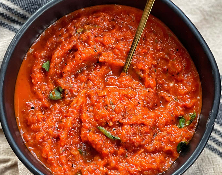 roasted red bell pepper and garlic sauce in a bowl
