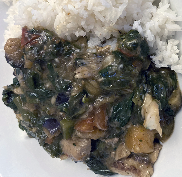 Sao Tomean calulu served on a plate with rice