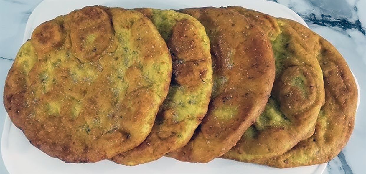 soorok, Iranian fry bread on a plastic chopping board