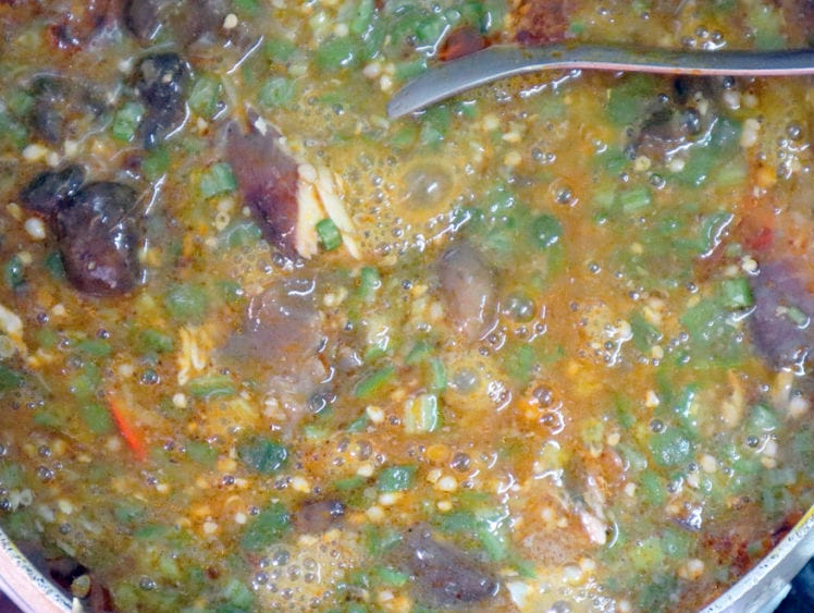okra and pounded fish soup served in a bowl