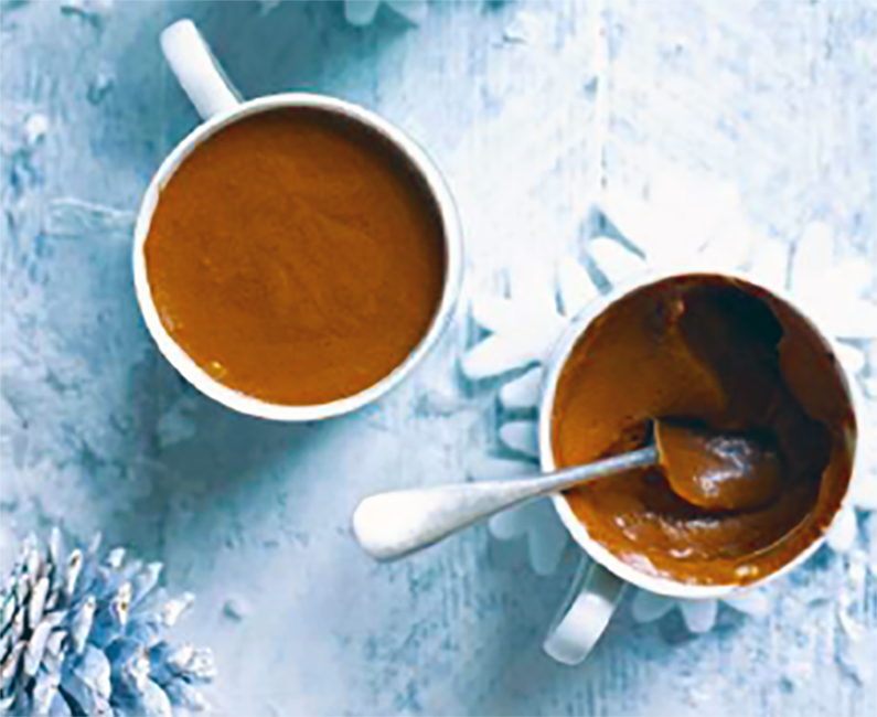 two mugs containing chocolate and coffee mousse