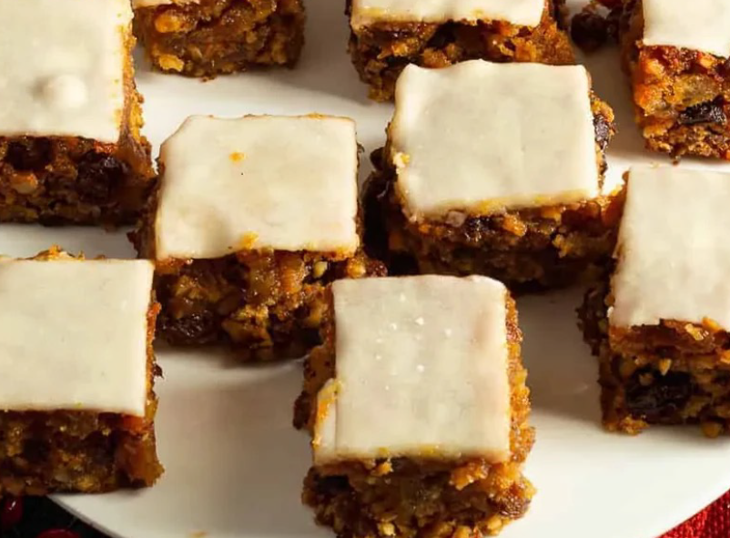 iced squares of Sri Lankan christmas cake served on a plate