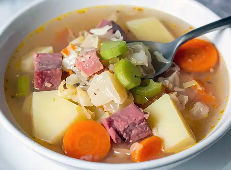 salt beef and vegetable soup in a bowl