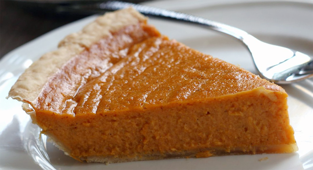 wedge of sweet potato pie on a plate