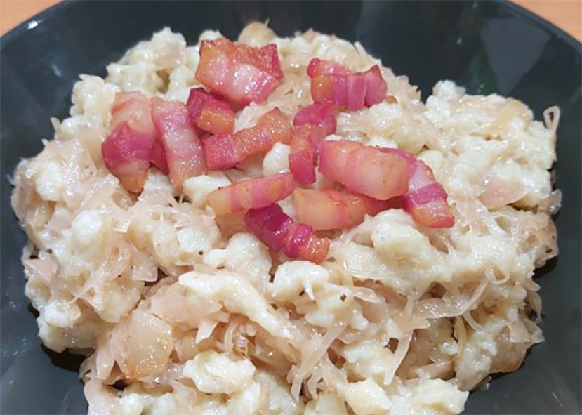 sauerkraut with bacon served in a bowl