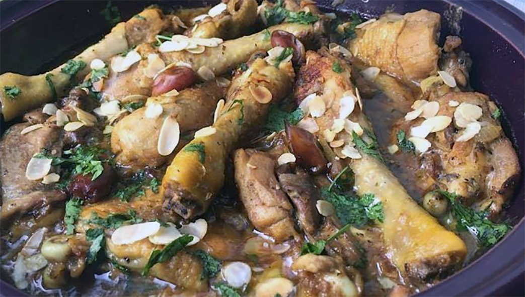 chicken and date tagine garnished with slivered dates