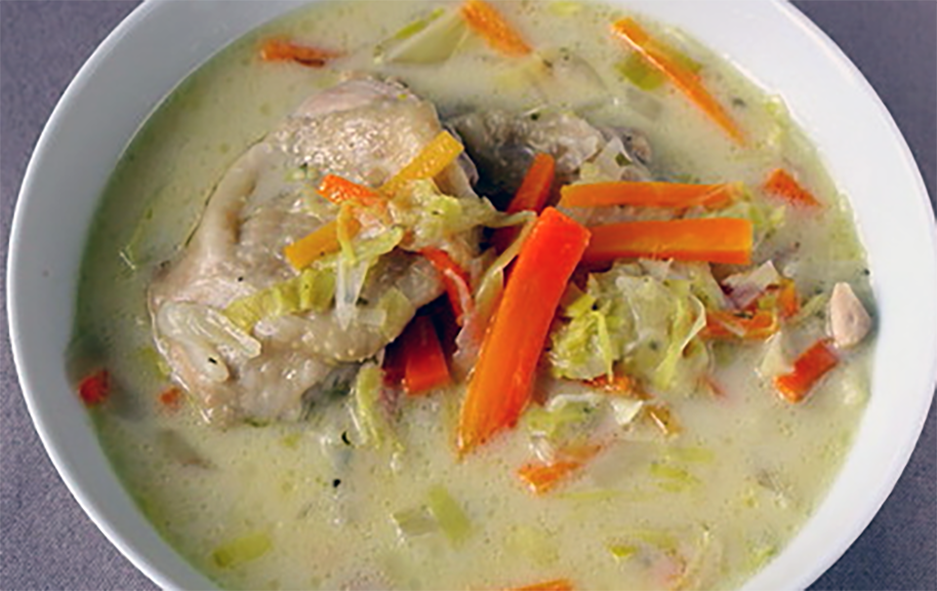 waterzooi chicken in a white bowl
