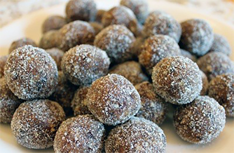candied sugar plums on a chopping board
