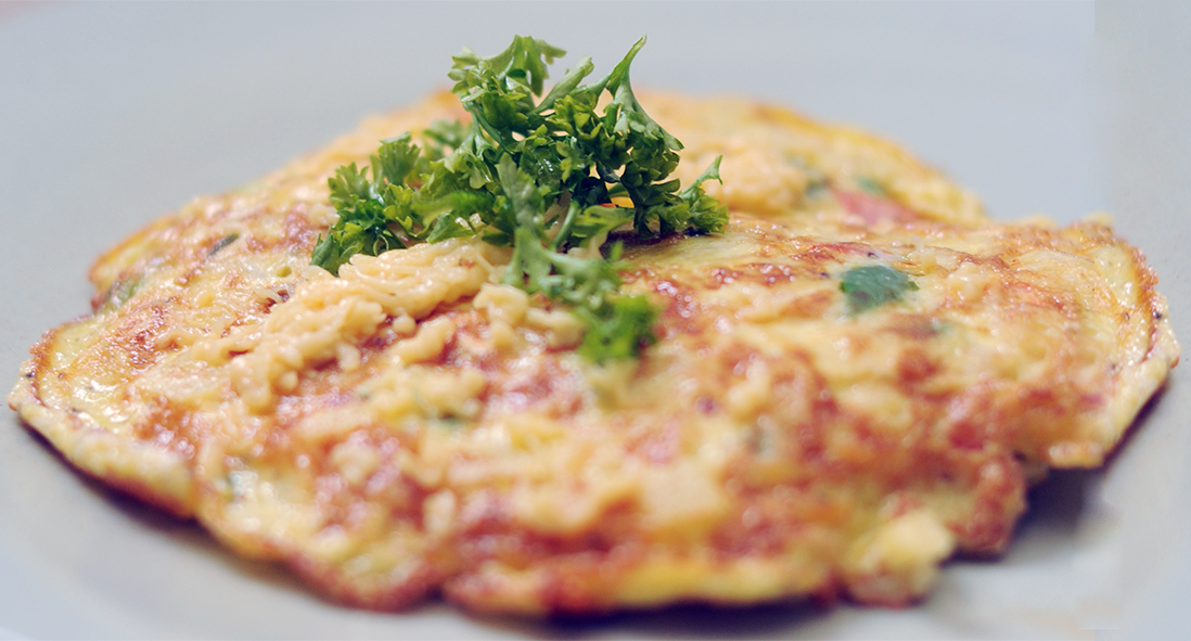 fluffy egg and cream omelette garnished with parsley