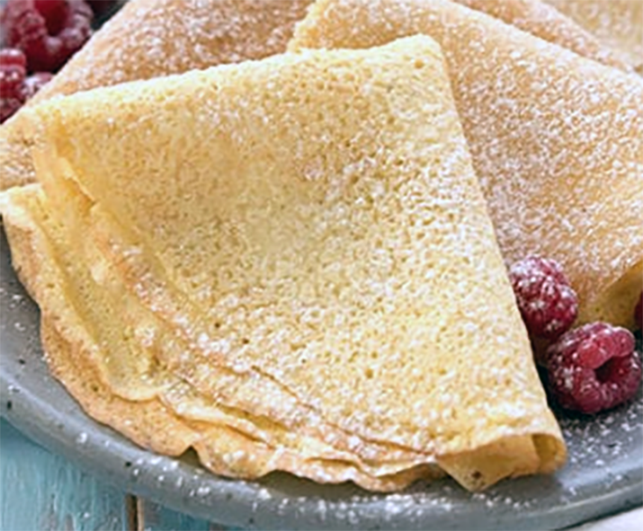 almond pancake served folded on a plate