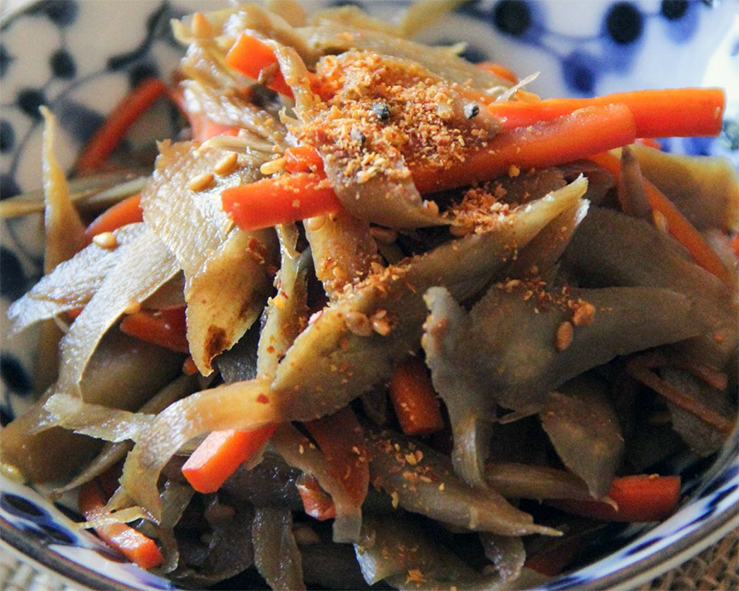 evening primrose root gobo in a small japanese bowl with Shichimi Togarashi topping