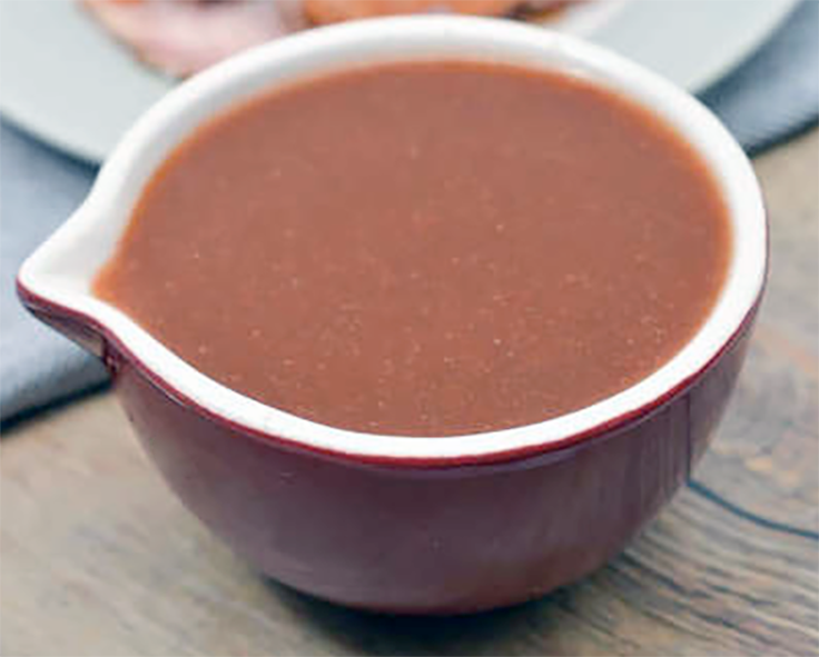 sharp sauce in a bowl with a pouring spout