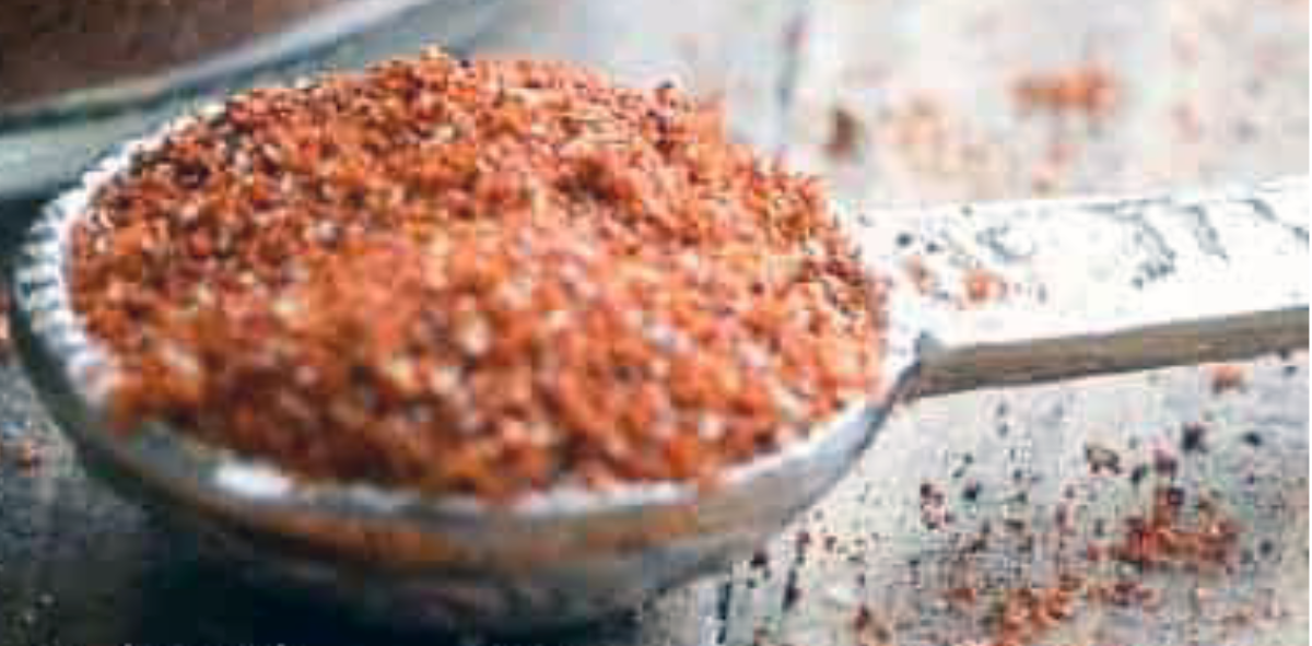 home made chili powder spice blend on a metal scoop</a>
