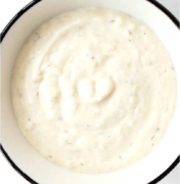 kebab shop style garlic sauce in an enamelled bowl