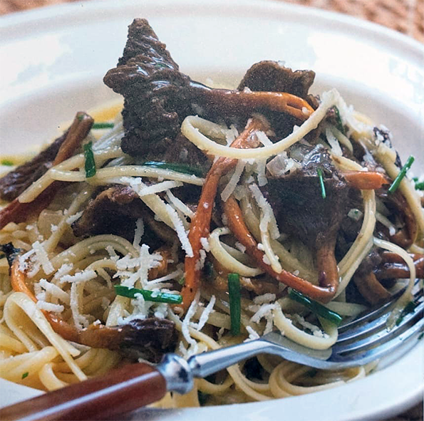 bowl of linguine pasta with a shallot, garlic and trumpet chanterelle sauce
