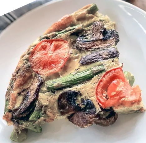 wedge of mushroom croustade with an asparagus and tomato topping