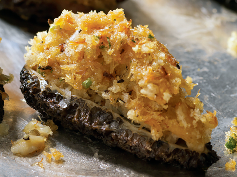 halved morel with crab meat and mayonnaise stuffing on a metal serving platter