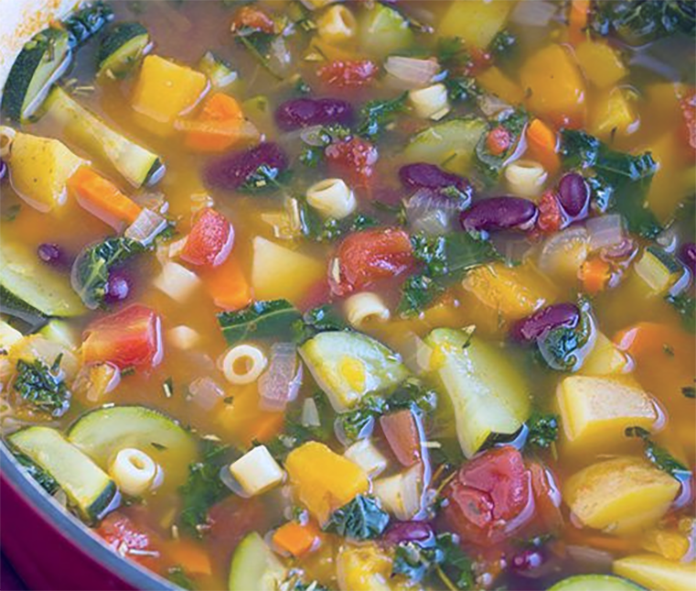 autumnal soup with mallow cheeses in a cast iron casserole