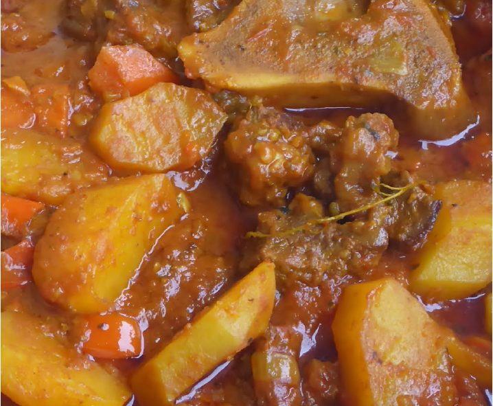 stew of shin of beef with potatoes and carrots in a curried base