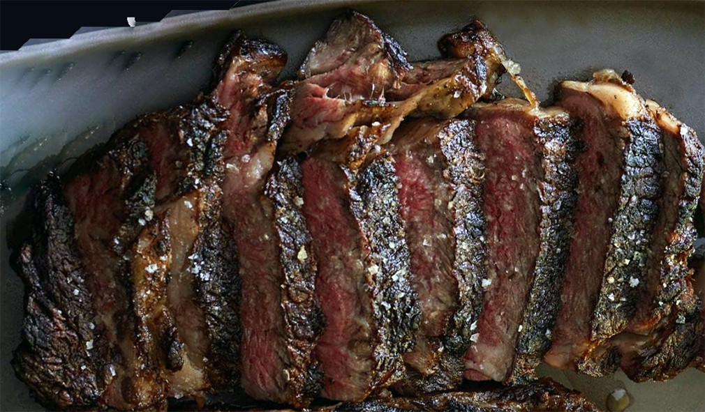 Botswana-style beef steak served sliced on a plate