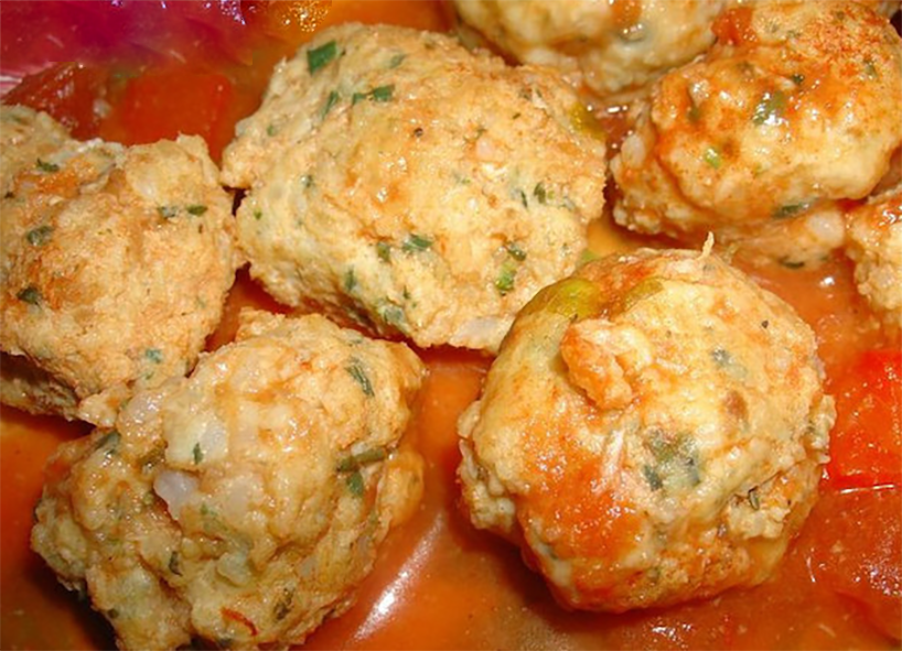fish balls served on a tomato sauce base