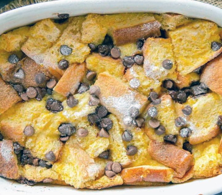 orange bread and butter pudding in a baking dish