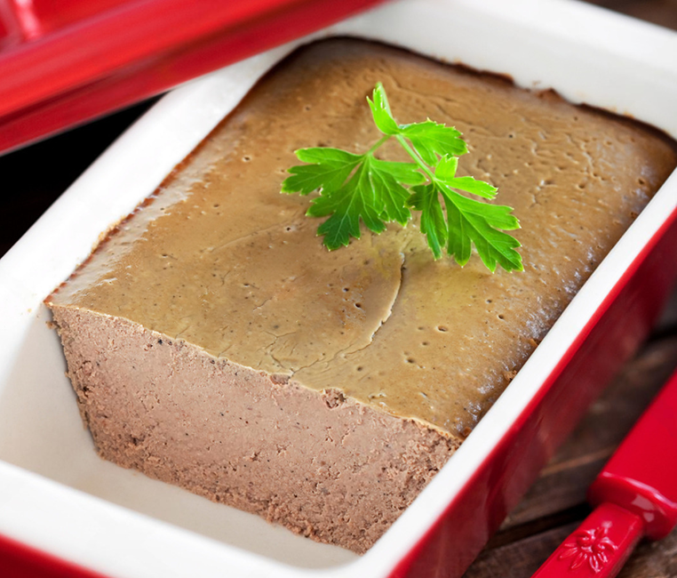 Chicken liver pate in a terrine.