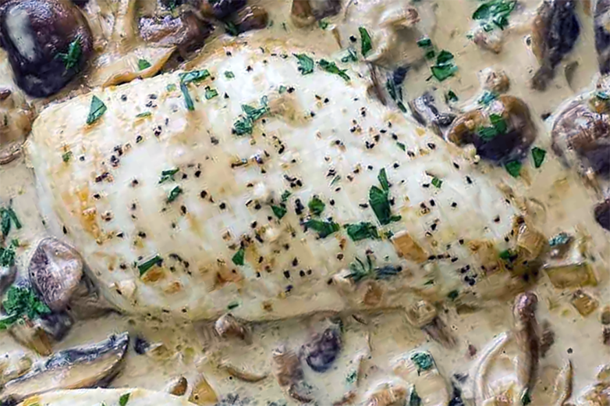 chicken served in a creamy wild mushroom sauce