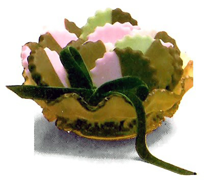 two-coloured chocolate mint creams arranged in a seashell bowl