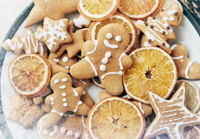 christmas honey biscuits in festive shapes garnished with icing