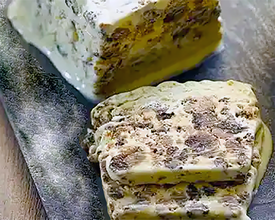 parfait made with leftover Christmas pudding in an egg mousse base served on a slate board